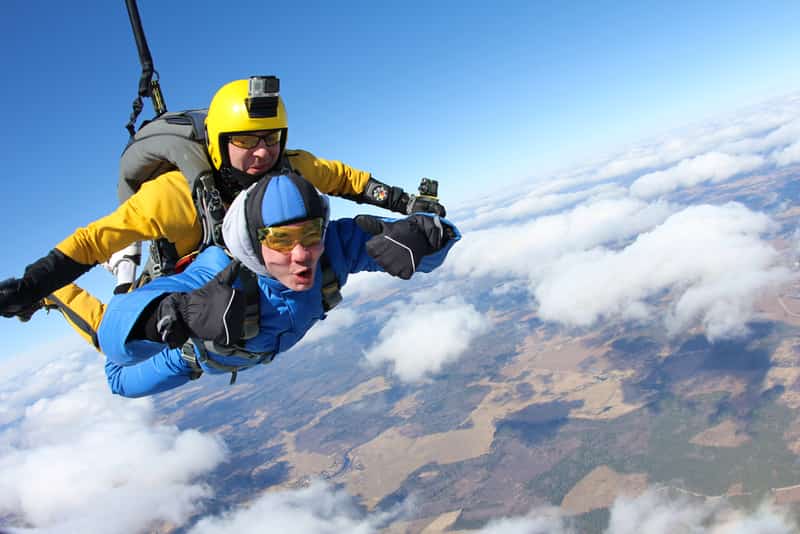 An instructor and a student in a tandem skydive jump