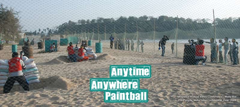 Visitors engaged in a game of paintball