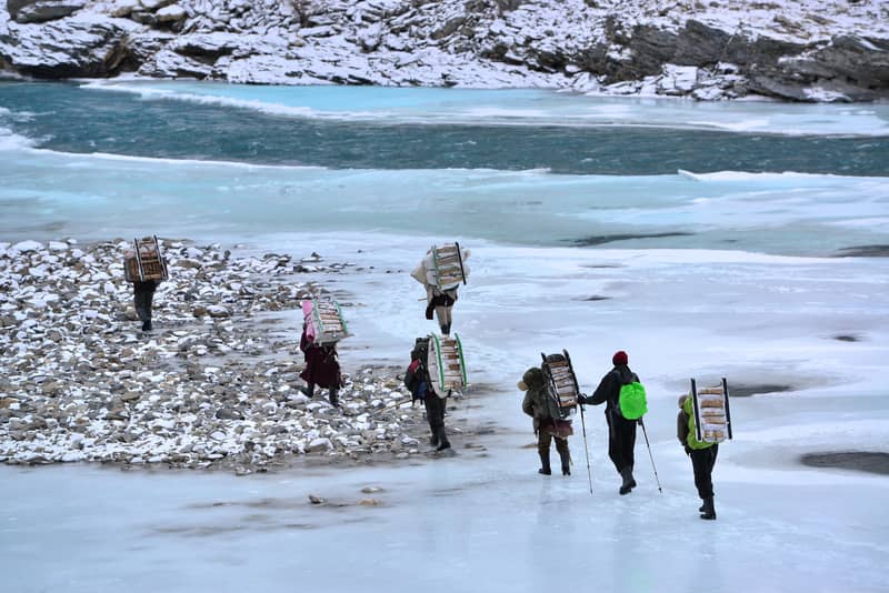 Trekkers passing through the Zanskar Lake