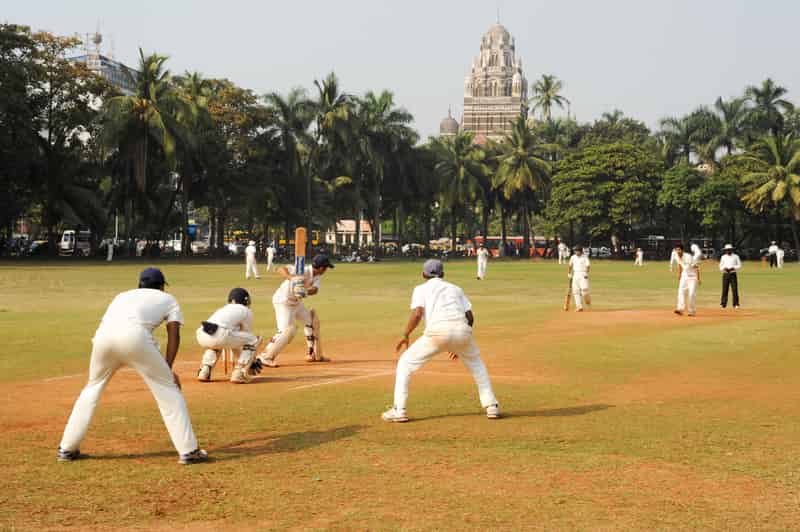 Watch a game of cricket at the Oval Maidan in Mumbai