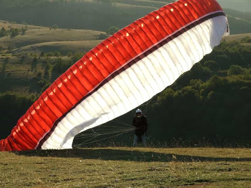 A tourist enjoying paragliding in Mussoorie 