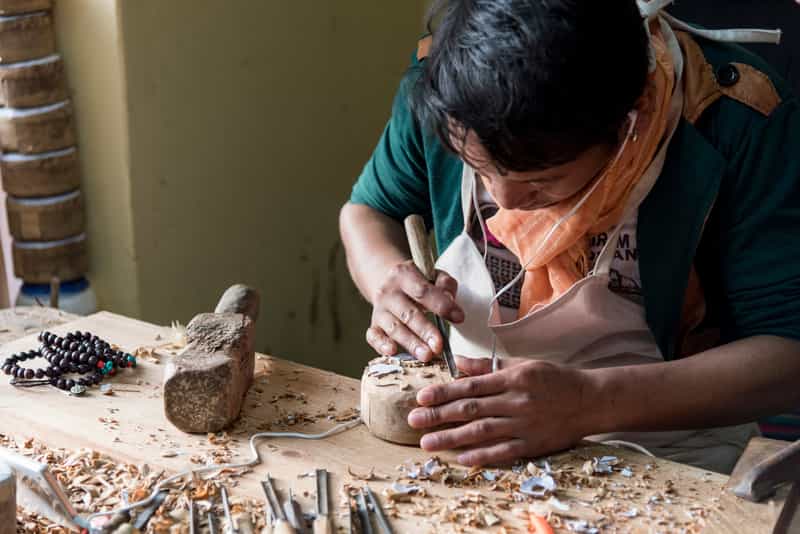 Tibetan artisans working their traditional trades are a common sight at the Norbulingka Institute