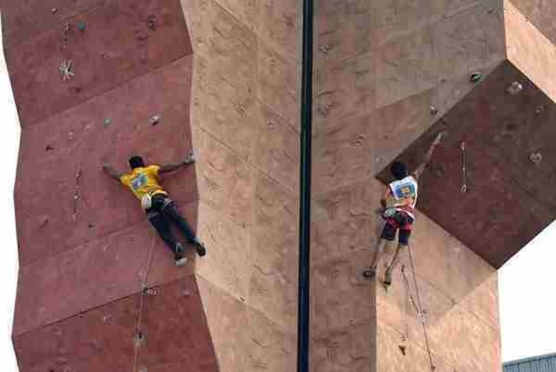 Climbers practicing at the artificial wall