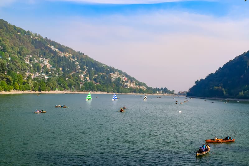 Enjoy scenic views of the hills from the Nainital Lake