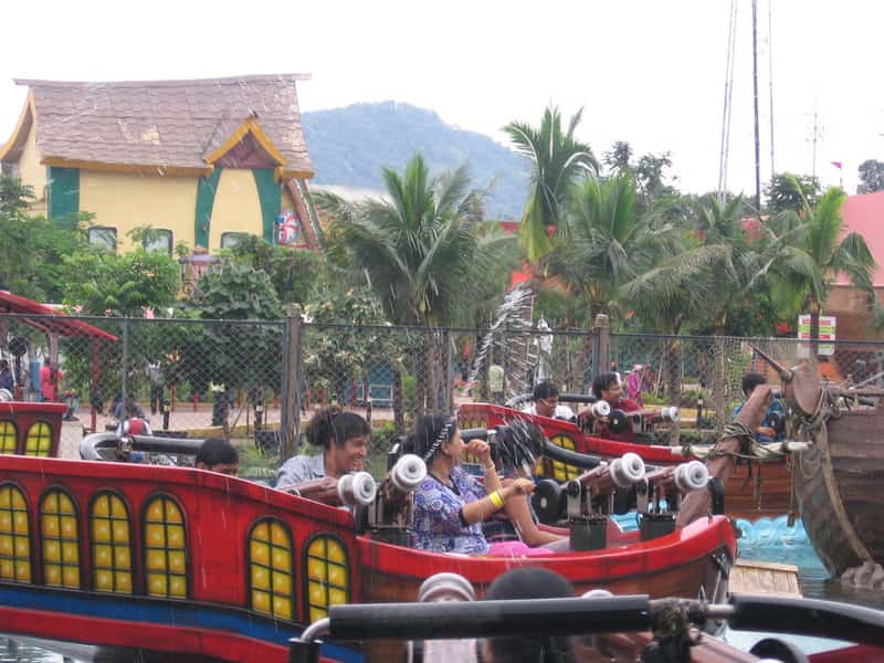 Visitors enjoying themselves on one of the rides
