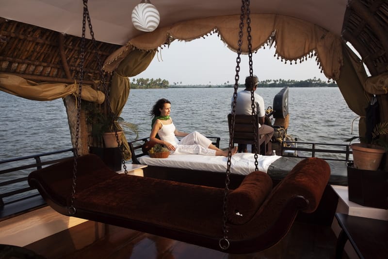 Relax and soak in the lovely surroundings on a houseboat in Alleppey