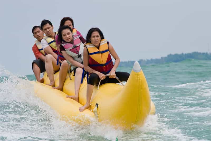 Tourists enjoying a banana boat ride