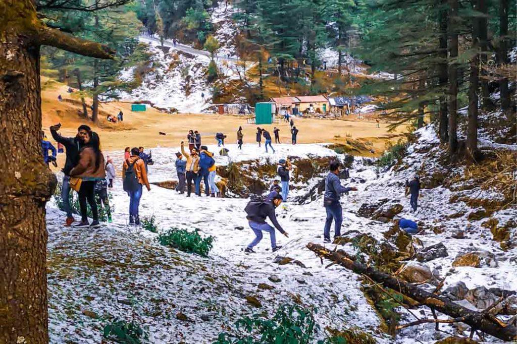 Tourists enjoying themselves in Mussoorie's snow. 