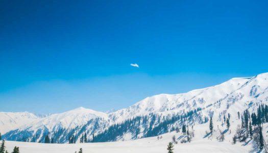 Experience Snowfall In Kashmir – Admire The White Draping Of The Hills In The Valley
