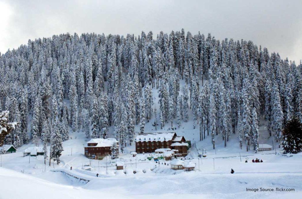 Visit Gulmarg to experience snowfall in Kashmir.