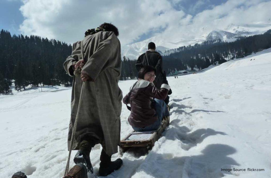 Sleigh riding-things to do during snowfall in Kashmir