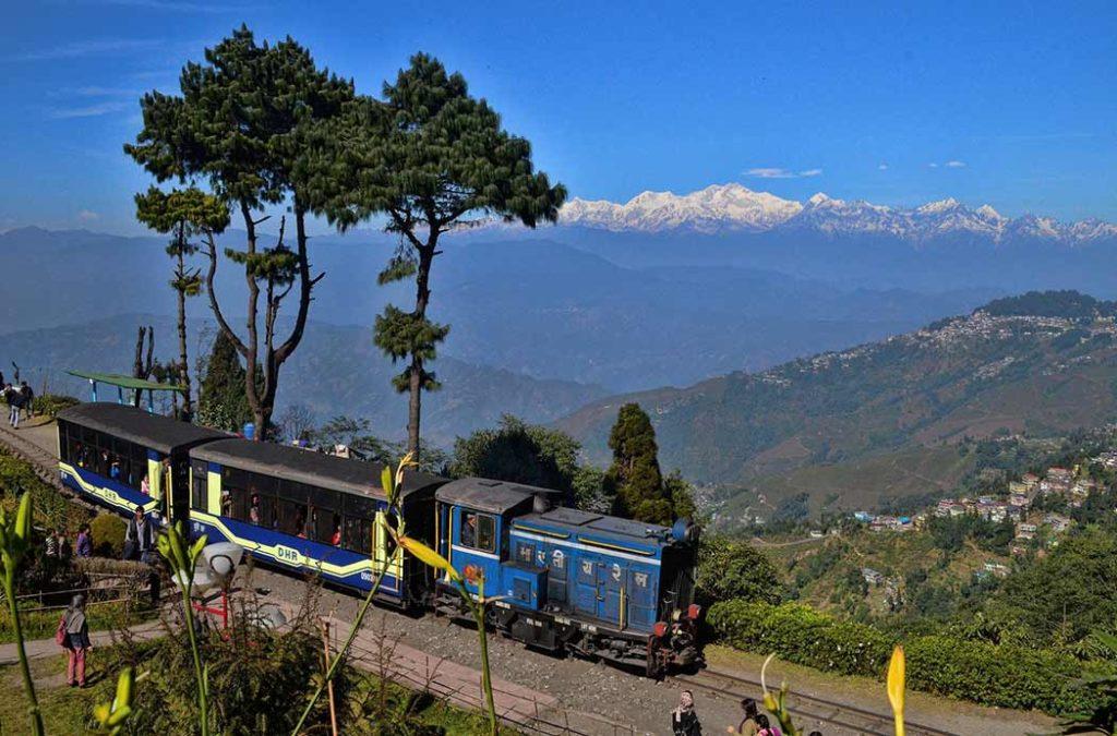 Get views of the Kanchenjunga in the Darjeeling toy train one of the oldest toy trains in India.