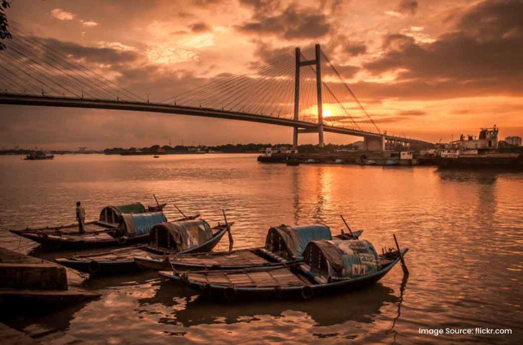 Take a boat ride on the Hooghly River near Howrah Bridge as one of the things to do in Kolkata.