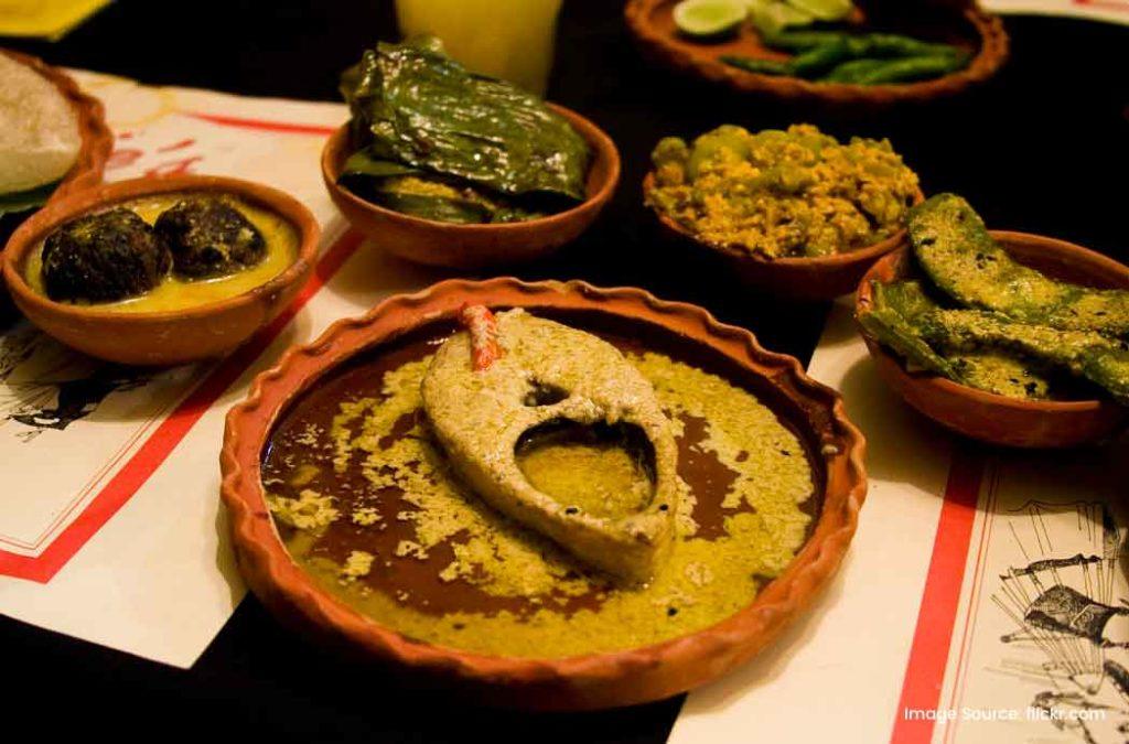 Try authentic Bengali cuisine at local restaurants, one of the famous things to do in Kolkata.